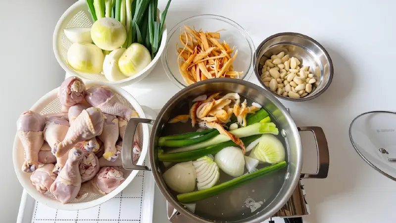 A bowl of homemade Dak Gomtang, a comforting Korean chicken soup with hwangtaechae